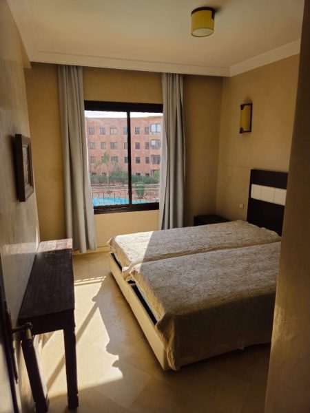 chambre à coucher d'un appartement à vendre à Marrakech